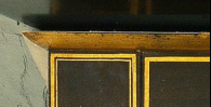 Photograph of aPorter motif on the secretary-bookcase.