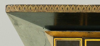 Photograph of a stenciled border on a secretary-bookcase.