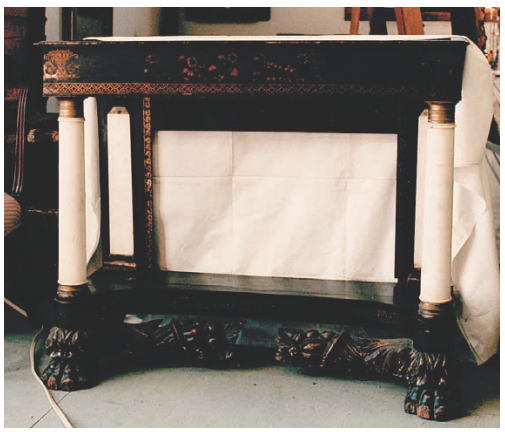Photograph of an American Empire pier table. G. On the art market in 1987.
